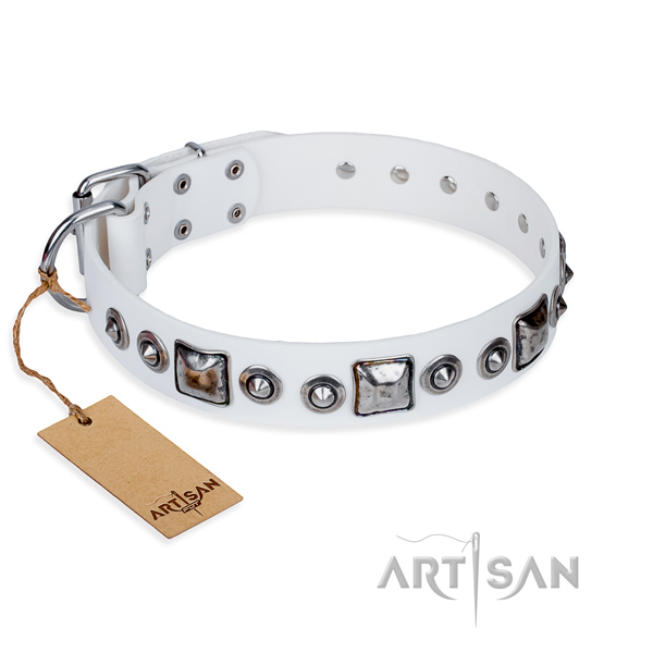 Genuine leather dog collar made of gentle to touch material with durable hardware